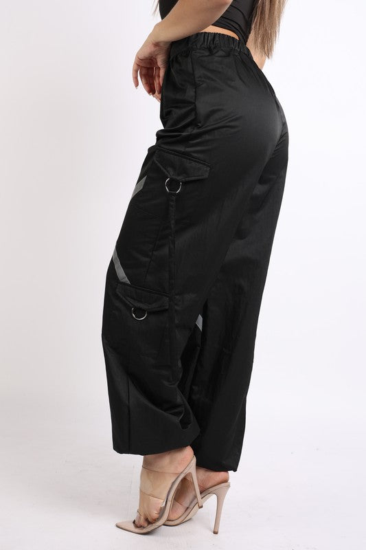 Windbreaker pants with reflective detail
